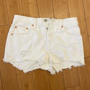 Levi’s 501 white ripped cutoff denim shorts